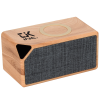 Branded wood-looking wireless speaker and charger