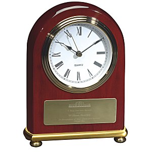 Branded rosewood arch clock with roman numerals