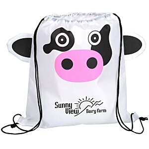 White drawstring bag that looks like a cow with black spots and a pink nose