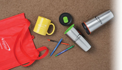 Promotional products that includes a tote, a mug, pens and tumblers
