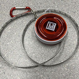 Carabiner Round Tape Measure shown on table